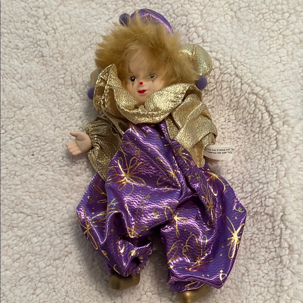Source Unknown Purple and Gold Plush Dolls